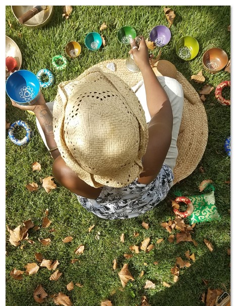 Simone Jenifer photographer from above at an outdoor sound bath, at a client's home